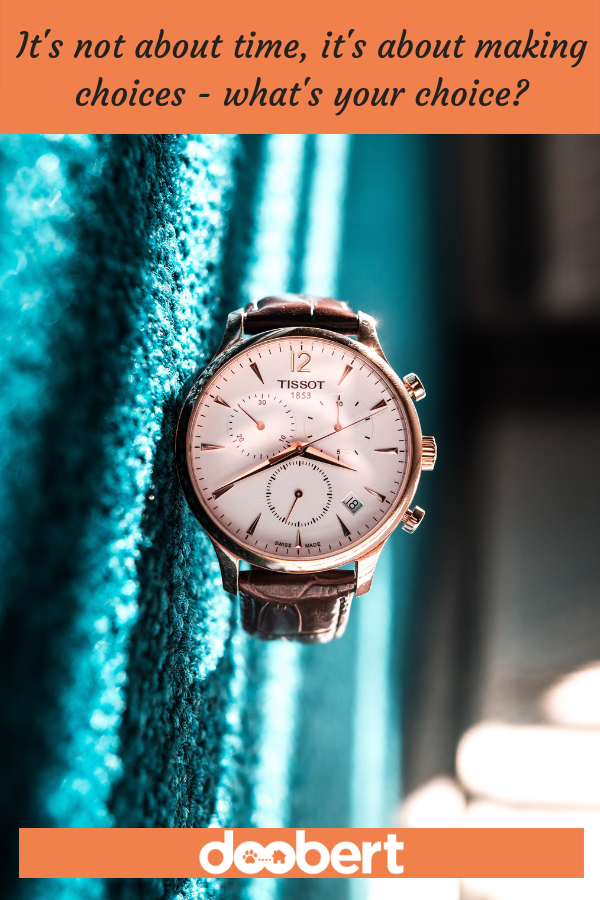rose gold watch against teal background